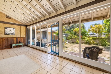 Bright and airy screened in lanai with high ceilin
