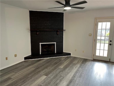 Wood Burning Fireplace and Patio Entrance