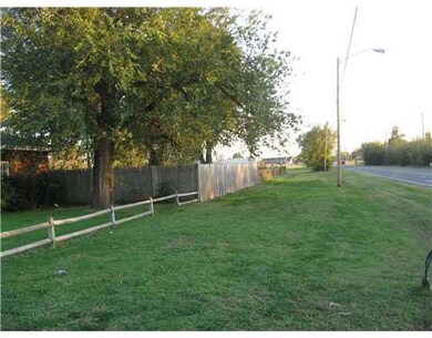 Yard/Garden. yard extends past wood fence includes