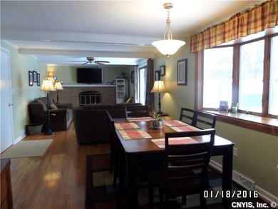 Kitchen Glistening hardwoods shimmer with all the 