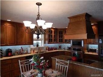 Granite Countertops, Tiled Backsplash and Recessed