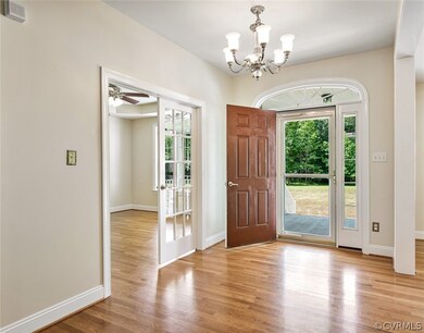 Foyer view to bedroom 4 and front porch