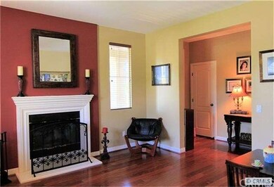 Formal living room with hardwood floors