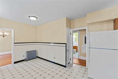 formal dining room with gleaming hardwoods