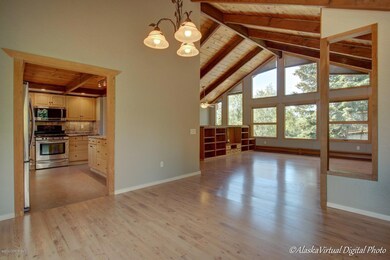 Dining to kitchen and living areas