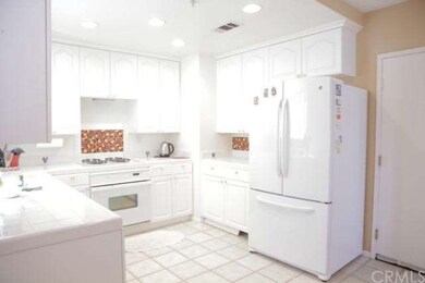 Garden View Kitchen is Bright and features Hand-set Tile Counter Tops