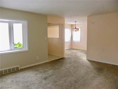 Large living room with bay window.