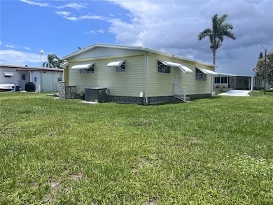 Exterior, showing the east and south side of the home.