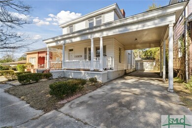 Large covered car port with off street parking for