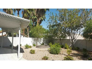 Exterior Back. Low maintenance, desert landscape.