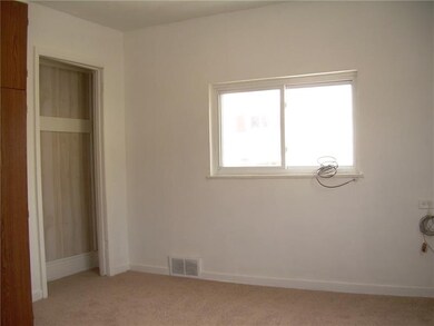 The master bedroom is roomy.