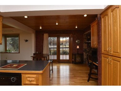 Lovely wood floor and ceiling embrace the heart of