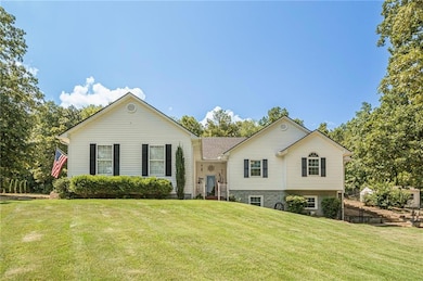View of front of house featuring a front lawn