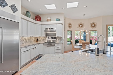 Kitchen with Granite Island & Bay Window