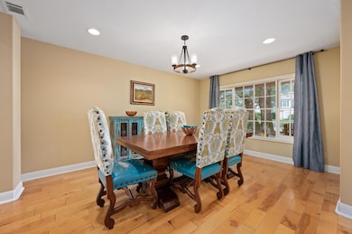 Dining space featuring light wood-style floors, a