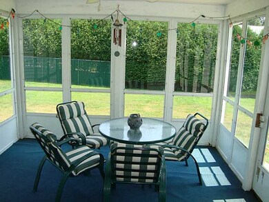 Patio/Deck. Three season room is right off the kit