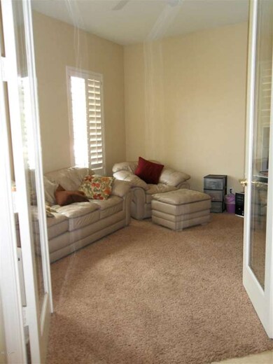 Den w/ french doors off of front entry