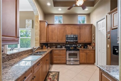 Kitchen with appliances with stainless steel finis