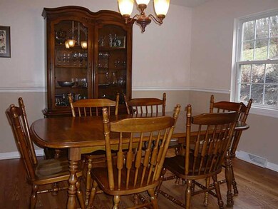 Dining Room. Formal Dining Room opens into adjacent Living Room...which adds extra space for holiday dining.
