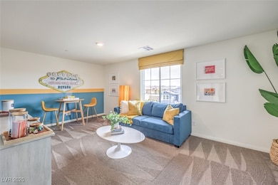 Carpeted living area with baseboards and visible .