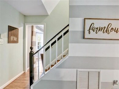 AN INVITING FOYER w/ NEW PERGO-PLANK FLOORING, NEW