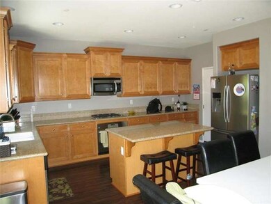 Spacious Kitchen and easy walk around flow for man