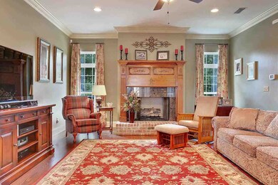 Cozy living room with gas fireplace and brick hear