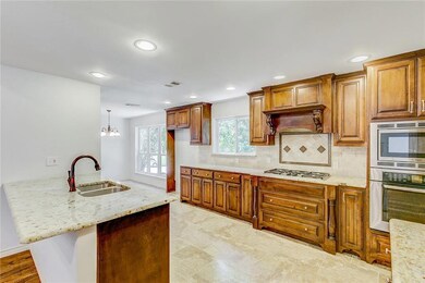 Large kitchen with open floor plan to living room 
