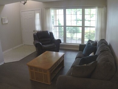 Living Room features new hardwood flooring and flo