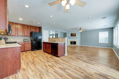 Kitchen opens to the homes den.