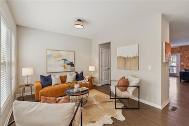 Living area featuring wood finished floors