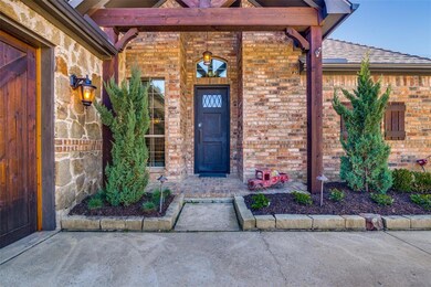 Beautiful tall entry with custom iron door.