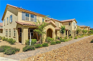 Mediterranean / spanish-style home with a tiled ro