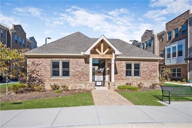 View of front of house with brick siding, a front 
