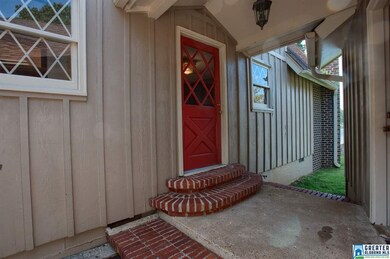 Home and  garage are attached with covered stoop o