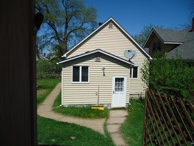 Rear view of property with fence