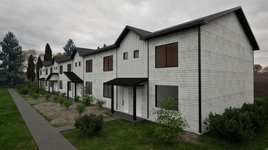Modern inspired farmhouse with a residential view and a front lawn