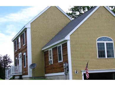Exterior Front. Drive end view of house