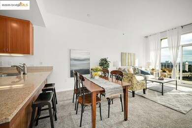 Dining space featuring light carpet and baseboards