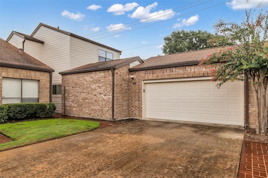 This charming, well-maintained brick townhome feat