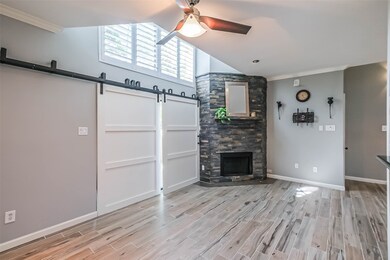 Check out the beautifully updated fireplace with its stunning stone surround!