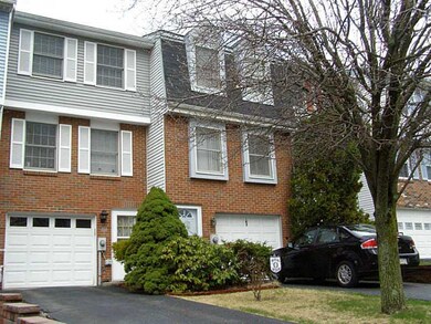 Exterior Front. Single Car Garage with Paved Drive