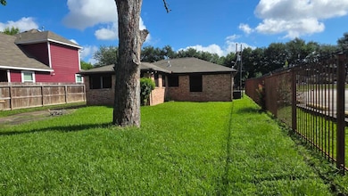 Large backyard next to church.