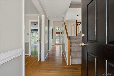Entrance foyer featuring light hardwood / wood-sty