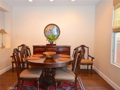FORMAL DINING AREA WITH DIRECT ACCESS TO THE KITCHEN AND OUTSIDE ENTERTAINING DECK.