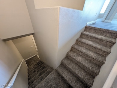 Stairs featuring baseboards