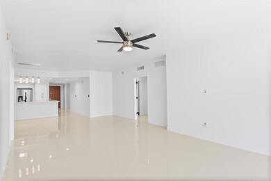 The same room looking back to the kitchen, entry a