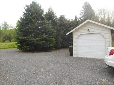An extra garage that is perfect for your lawn equi