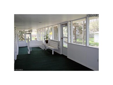 Super screened porch along the back of the house.