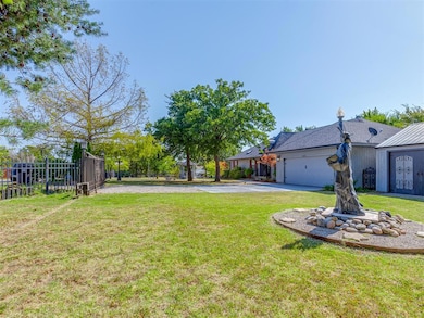 View of yard featuring a garage